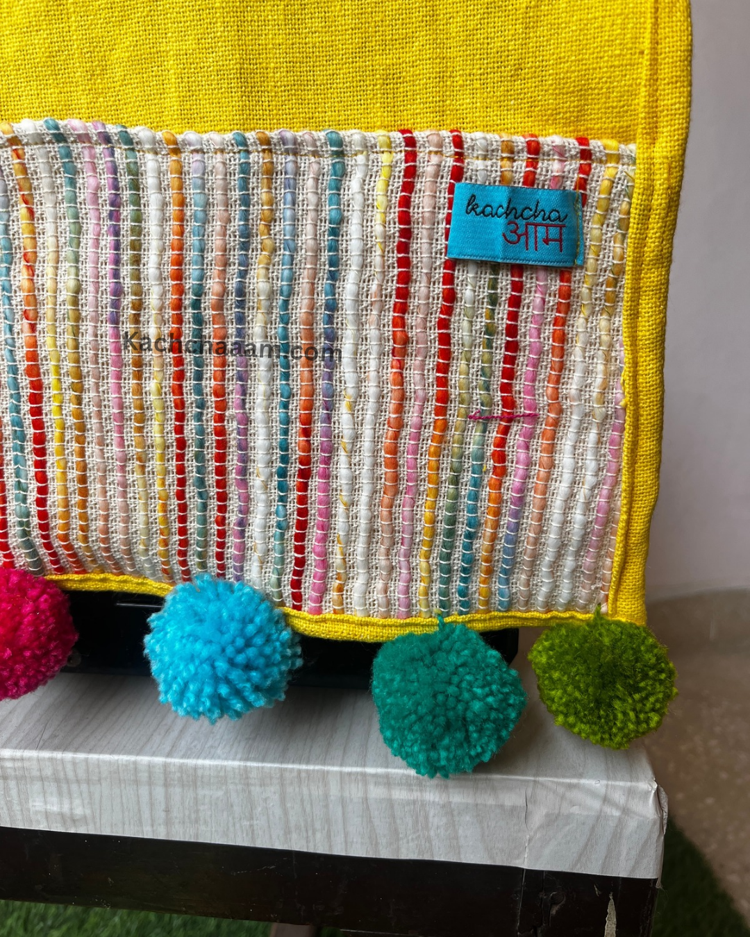 Yellow Cotton Slub Solid Microwave Cover with Multicolored Jacquard Fabric Pockets and Rainbow Pompom