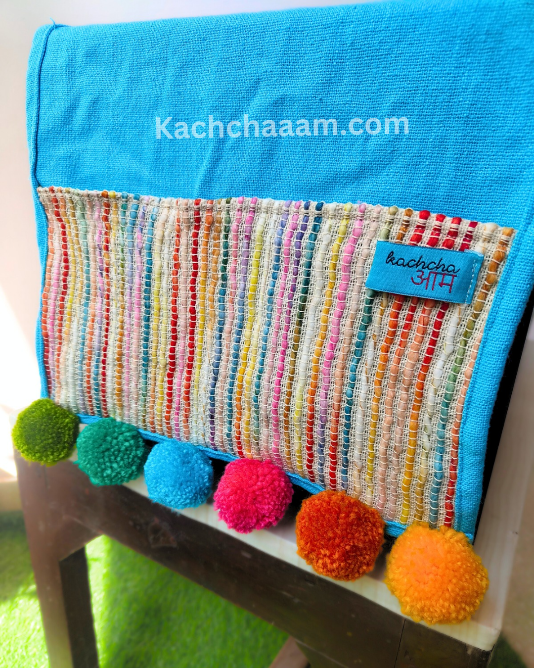 Sky Blue Cotton Slub Solid Microwave Cover with Multicolored Jacquard Fabric Pockets and Rainbow Pompom