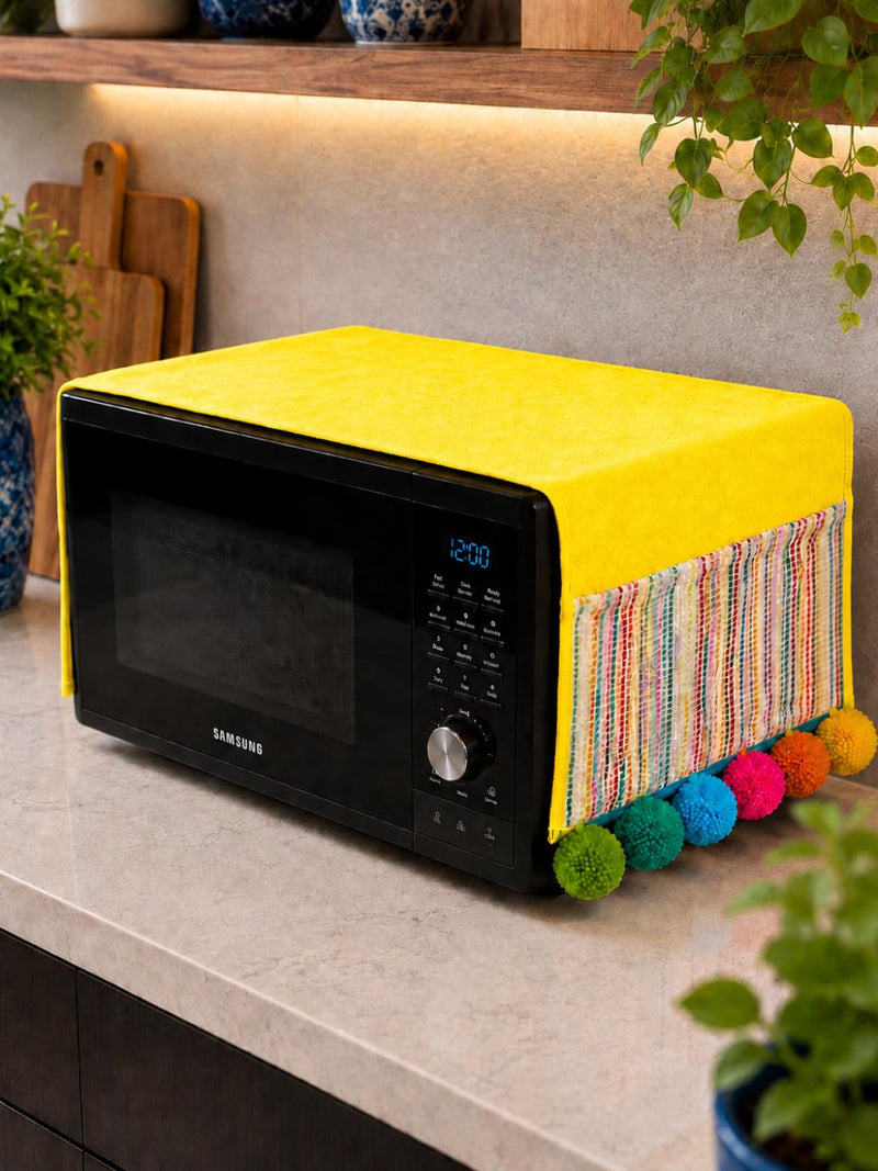 Yellow Cotton Slub Solid Microwave Cover with Multicolored Jacquard Fabric Pockets and Rainbow Pompom