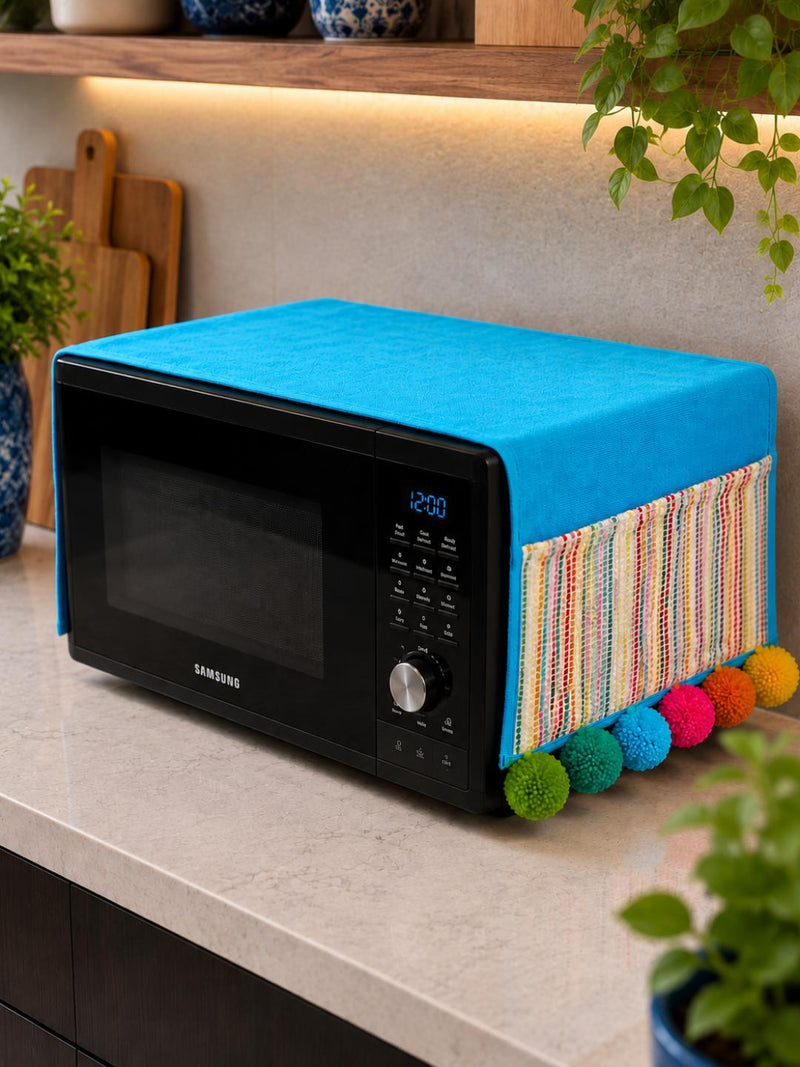 Sky Blue Cotton Slub Solid Microwave Cover with Multicolored Jacquard Fabric Pockets and Rainbow Pompom