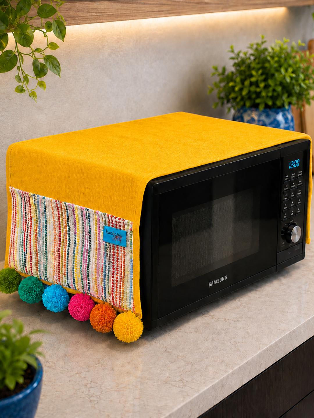 Marigold Cotton Slub Solid Microwave Cover with Multicolored Jacquard Fabric Pockets and Rainbow Pompom